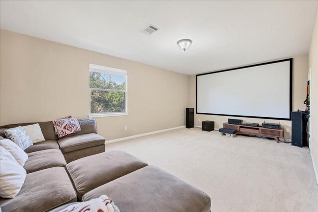 cinema room with light carpet