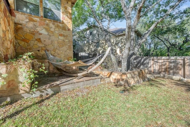 view of yard featuring fence