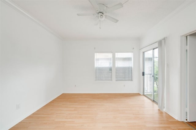 empty room with crown molding, ceiling fan, baseboards, and light wood-style floors