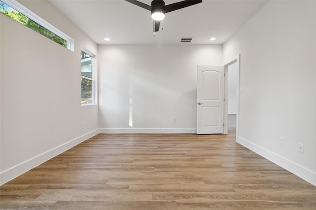 unfurnished room with light hardwood / wood-style floors and ceiling fan