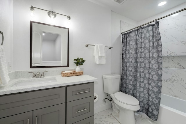 full bathroom featuring toilet, vanity, and shower / bath combo with shower curtain