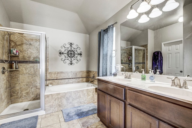 bathroom featuring tile patterned flooring, a chandelier, vanity, shower with separate bathtub, and vaulted ceiling