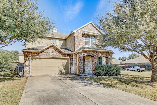 view of front of house featuring a front lawn and a garage