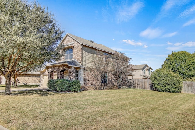 view of front of property featuring a front yard