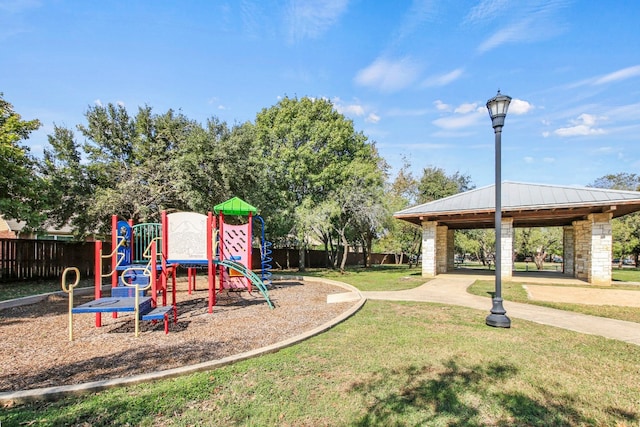 view of play area with a lawn and a gazebo