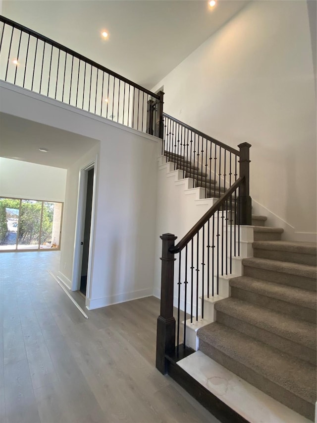 stairway with wood-type flooring