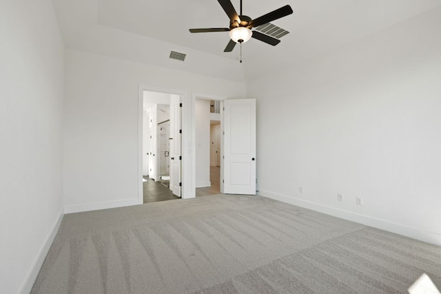 1515 Cardinal Ln, Round Rock, TX 78681 - unfurnished bedroom with carpet flooring, connected bathroom, and a ceiling fan