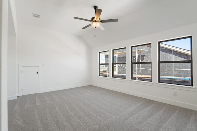 1515 Cardinal Ln, Round Rock, TX 78681 - unfurnished room featuring carpet flooring, ceiling fan, lofted ceiling, and baseboards