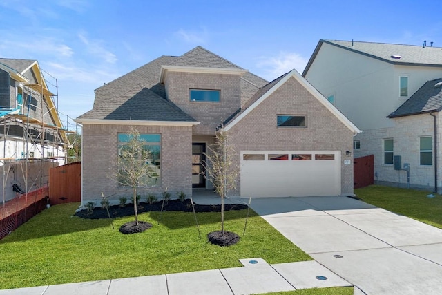 1515 Cardinal Ln, Round Rock, TX 78681 - view of front of home featuring concrete driveway, brick siding, roof with shingles, and a garage