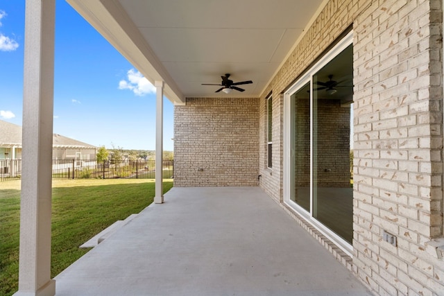 view of patio featuring ceiling fan