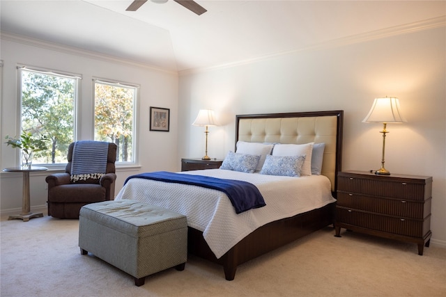 bedroom featuring ornamental molding, light carpet, ceiling fan, and lofted ceiling