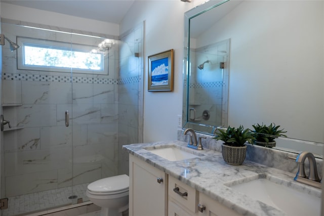 bathroom with a shower with door, vanity, tile patterned flooring, toilet, and lofted ceiling