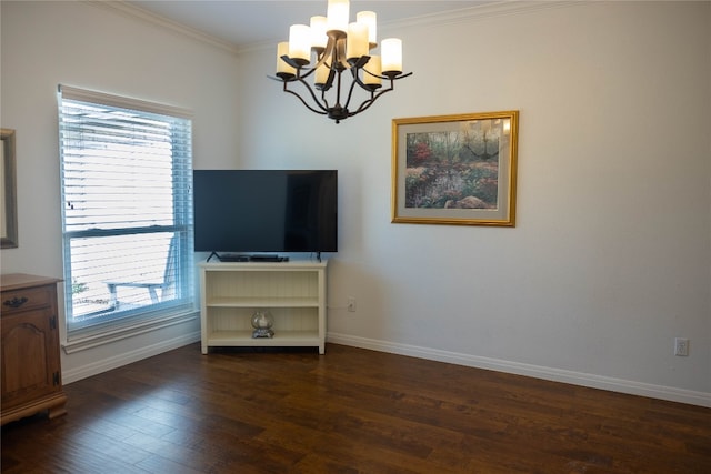 unfurnished living room featuring dark hardwood / wood-style floors, an inviting chandelier, and crown molding