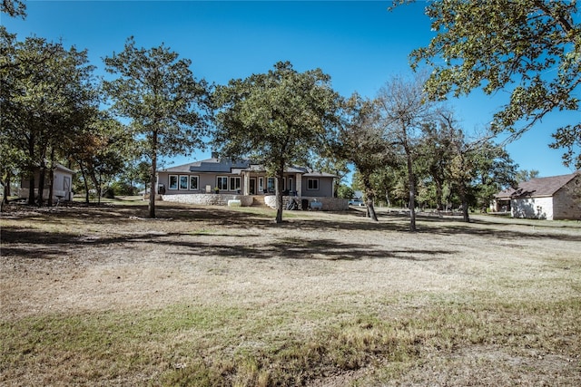 exterior space featuring a front lawn