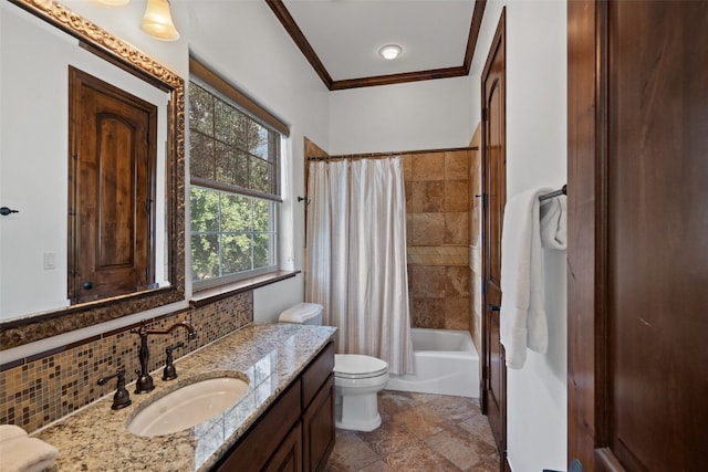 full bathroom featuring shower / bath combo with shower curtain, vanity, crown molding, toilet, and decorative backsplash