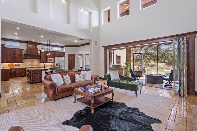 living room with a towering ceiling