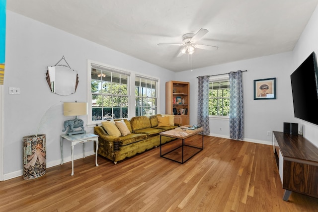 7909 Tisdale Dr, Austin, TX 78757 - living area with ceiling fan, light wood-type flooring, and baseboards