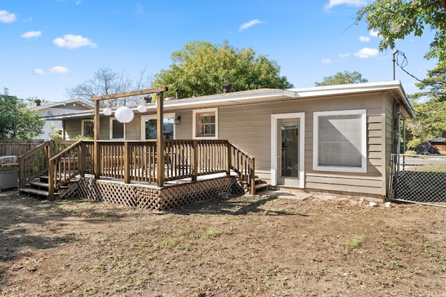 7909 Tisdale Dr, Austin, TX 78757 - back of property featuring a wooden deck and fence