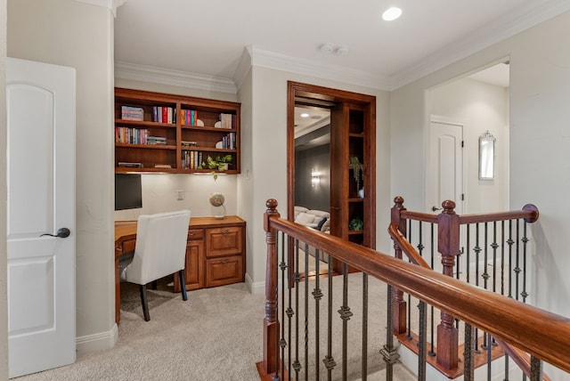 corridor featuring crown molding and light carpet