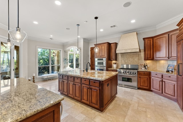 kitchen with hanging light fixtures, an island with sink, stainless steel appliances, and custom exhaust hood