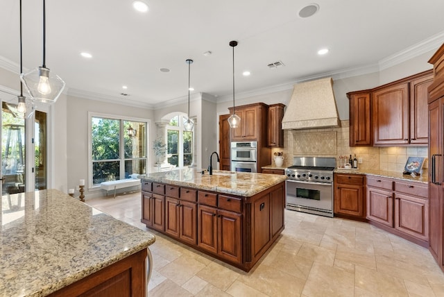 7409 Lantern View Dr, Jonestown, TX 78645 - kitchen with appliances with stainless steel finishes, premium range hood, an island with sink, tasteful backsplash, and light stone countertops