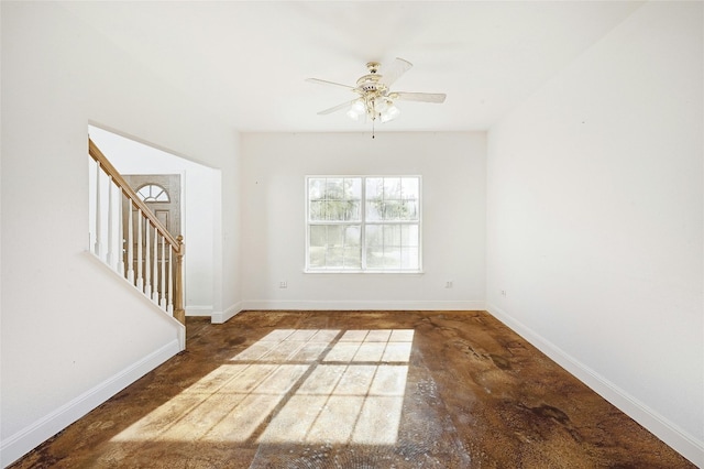 8302 N Madrone Trl, Austin, TX 78737 - spare room with stairs, a ceiling fan, and baseboards