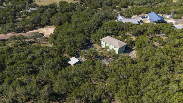 8302 N Madrone Trl, Austin, TX 78737 - aerial overview of property's location with a heavily wooded area