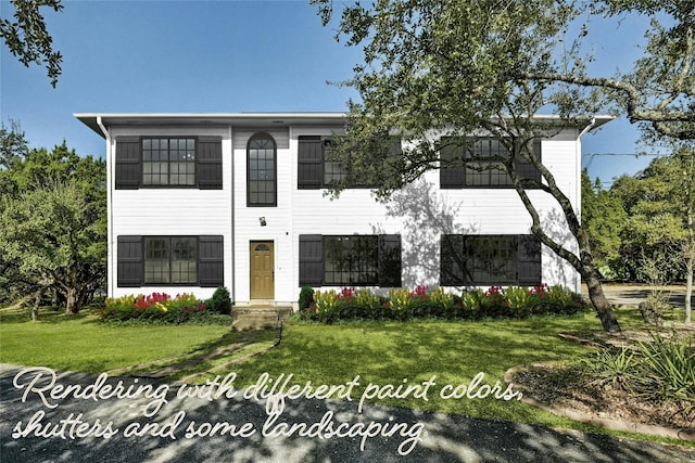 view of front facade with a front yard