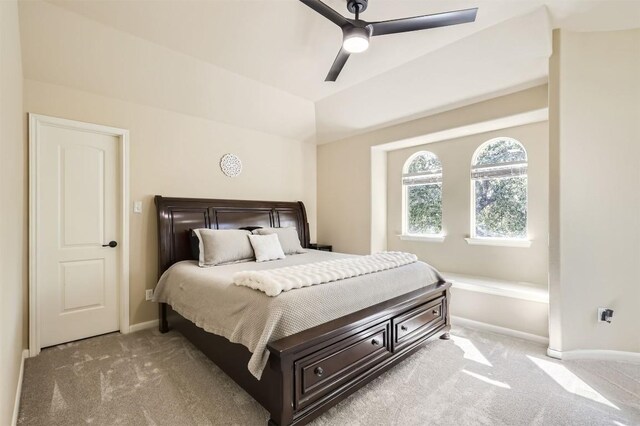 bedroom with light carpet and ceiling fan