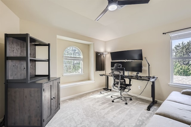 home office with light colored carpet and ceiling fan