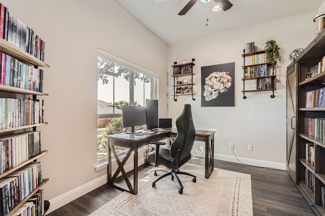 home office with dark wood-type flooring and ceiling fan