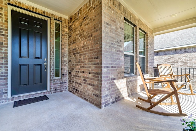 doorway to property with covered porch