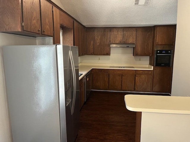 kitchen featuring black appliances, dark hardwood / wood-style floors, dark brown cabinets, and a textured ceiling