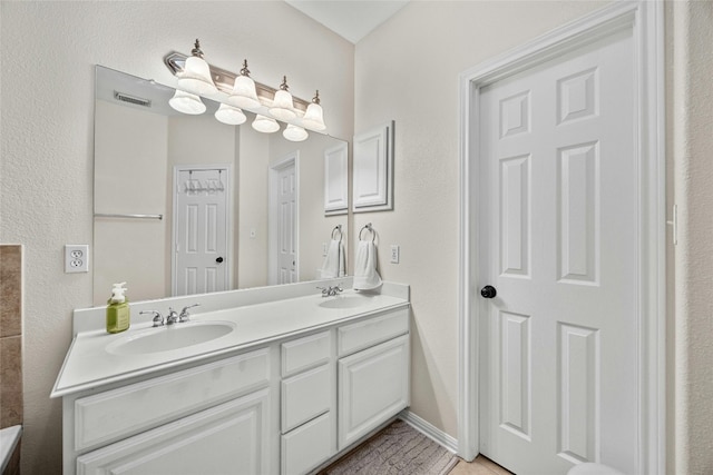 bathroom featuring vanity