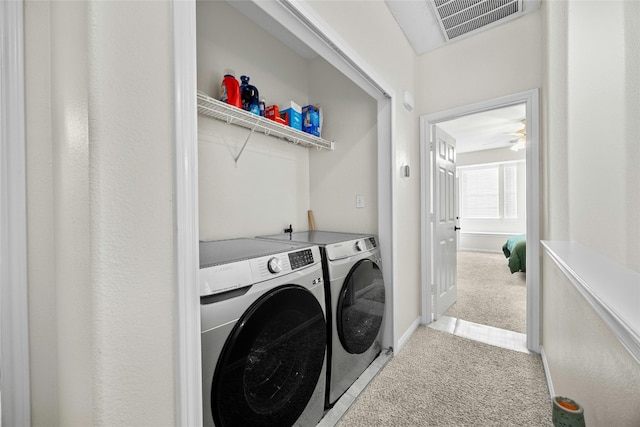 laundry room with carpet floors, ceiling fan, and independent washer and dryer