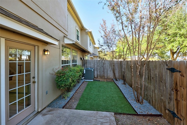 view of yard featuring central AC