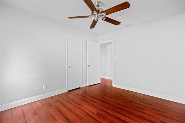 2803 Nordham Dr, Austin, TX 78745 - unfurnished room featuring wood finished floors and a ceiling fan