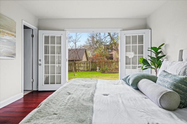 2803 Nordham Dr, Austin, TX 78745 - bedroom with access to exterior and wood finished floors