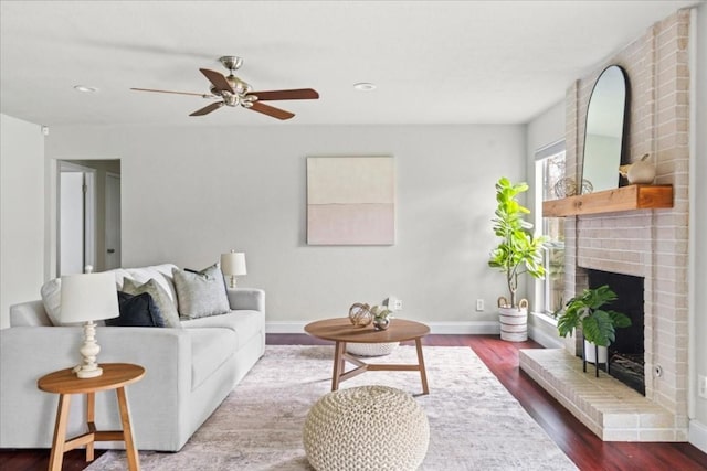 2803 Nordham Dr, Austin, TX 78745 - living area with a brick fireplace, a ceiling fan, wood finished floors, and recessed lighting