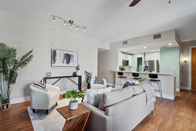 living room featuring light hardwood / wood-style floors