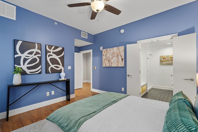 bedroom with hardwood / wood-style flooring and ceiling fan