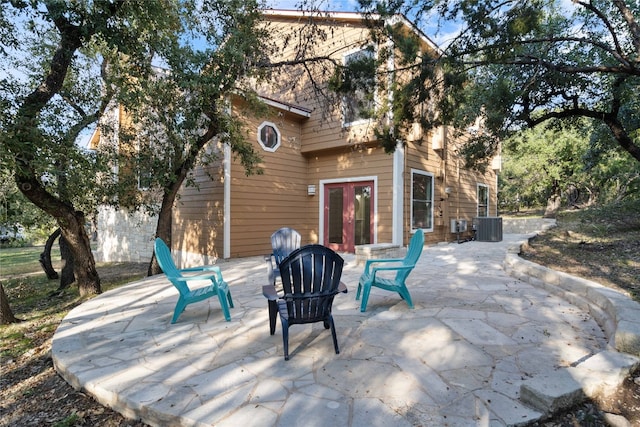 view of patio / terrace featuring french doors and central AC unit