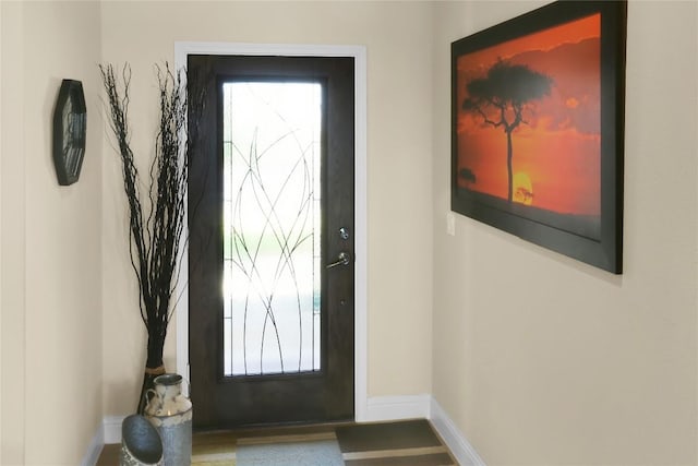 doorway with baseboards