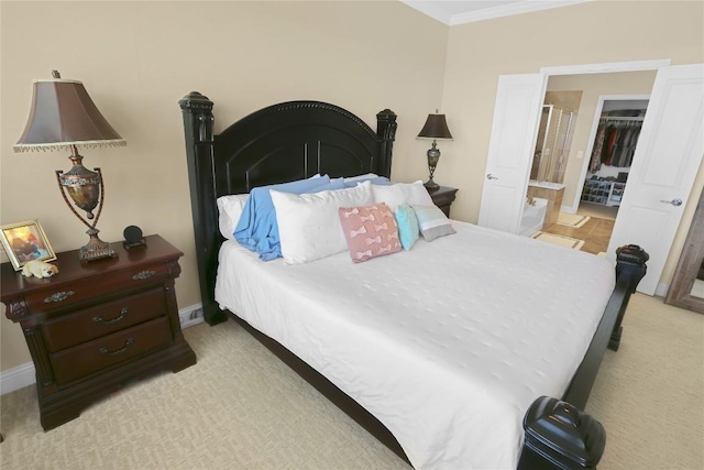 bedroom with baseboards, light colored carpet, and ornamental molding