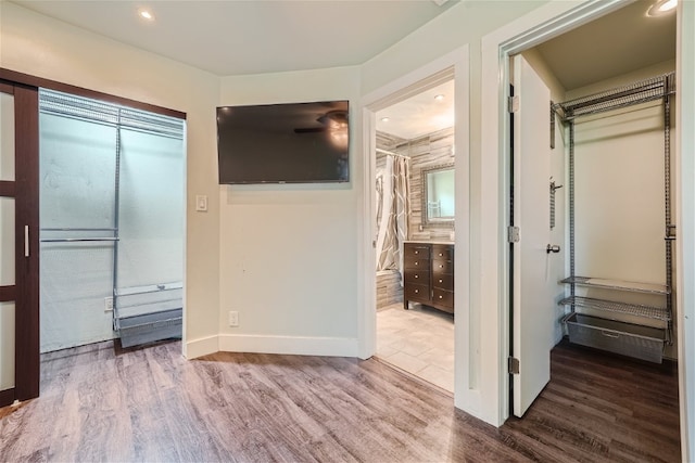 hall featuring wood-type flooring