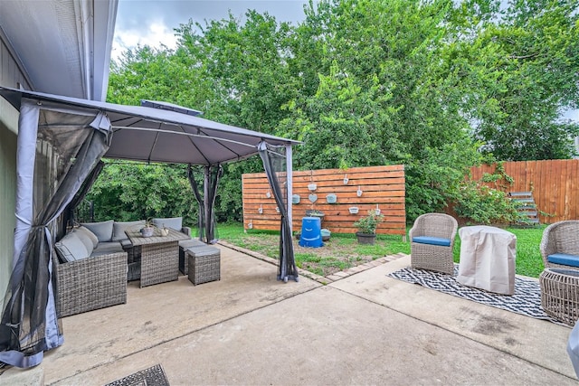 view of patio / terrace featuring a gazebo and an outdoor living space