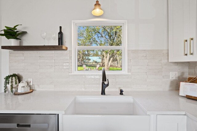 8000 Williamson Creek Dr, Austin, TX 78736 - kitchen with dishwasher, decorative backsplash, white cabinetry, and open shelves