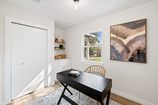 home office featuring light wood-type flooring