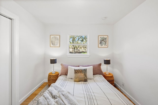 bedroom with light hardwood / wood-style flooring