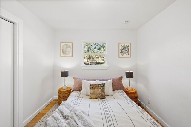 8000 Williamson Creek Dr, Austin, TX 78736 - bedroom with light wood finished floors and baseboards